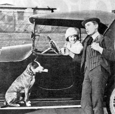 Harry Sweet with Brownie the Wonder Dog and actress Louise Lorraine while working for Century Films.