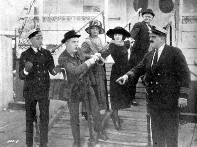 Harry Sweet, second from left, in the Century comedy Horse Sense with actress Alberta Vaughn, center. (Photo originally appeared in The Film Daily.)